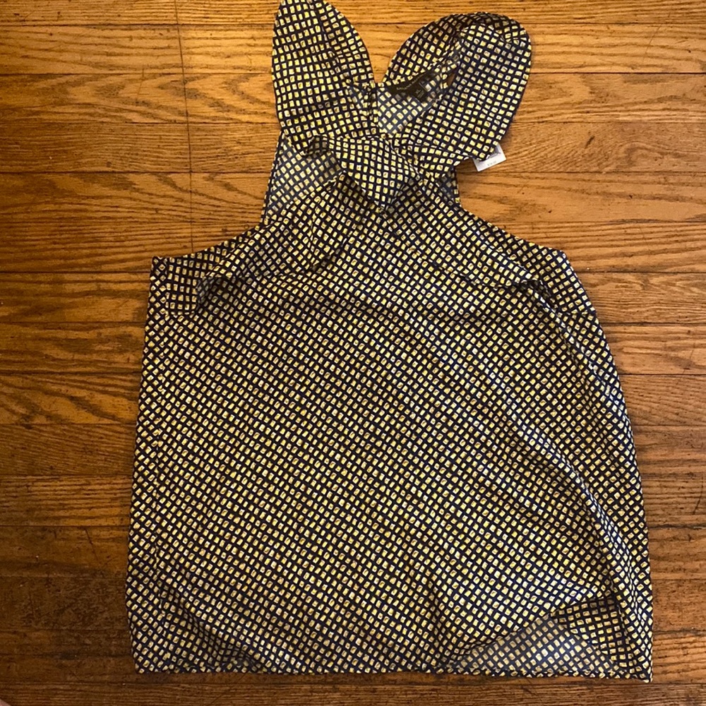 Banana Republic sleeveless shirt with ruffle.